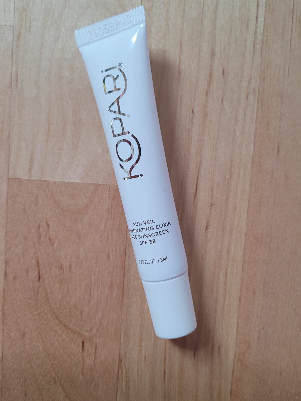 KOPARI Sun Veil Illuminating Elixir Face Sunscreen SPF 38 Mini 0.27 oz Travel